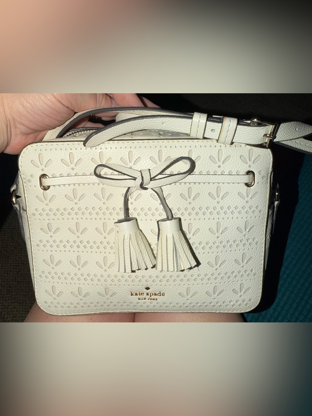 kate spade Hayes White laser-cut leather crossbody with tassel bow